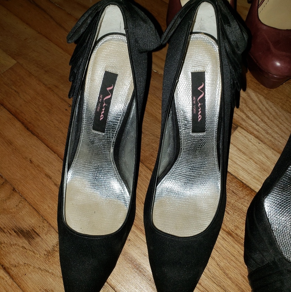 Black satin pumps